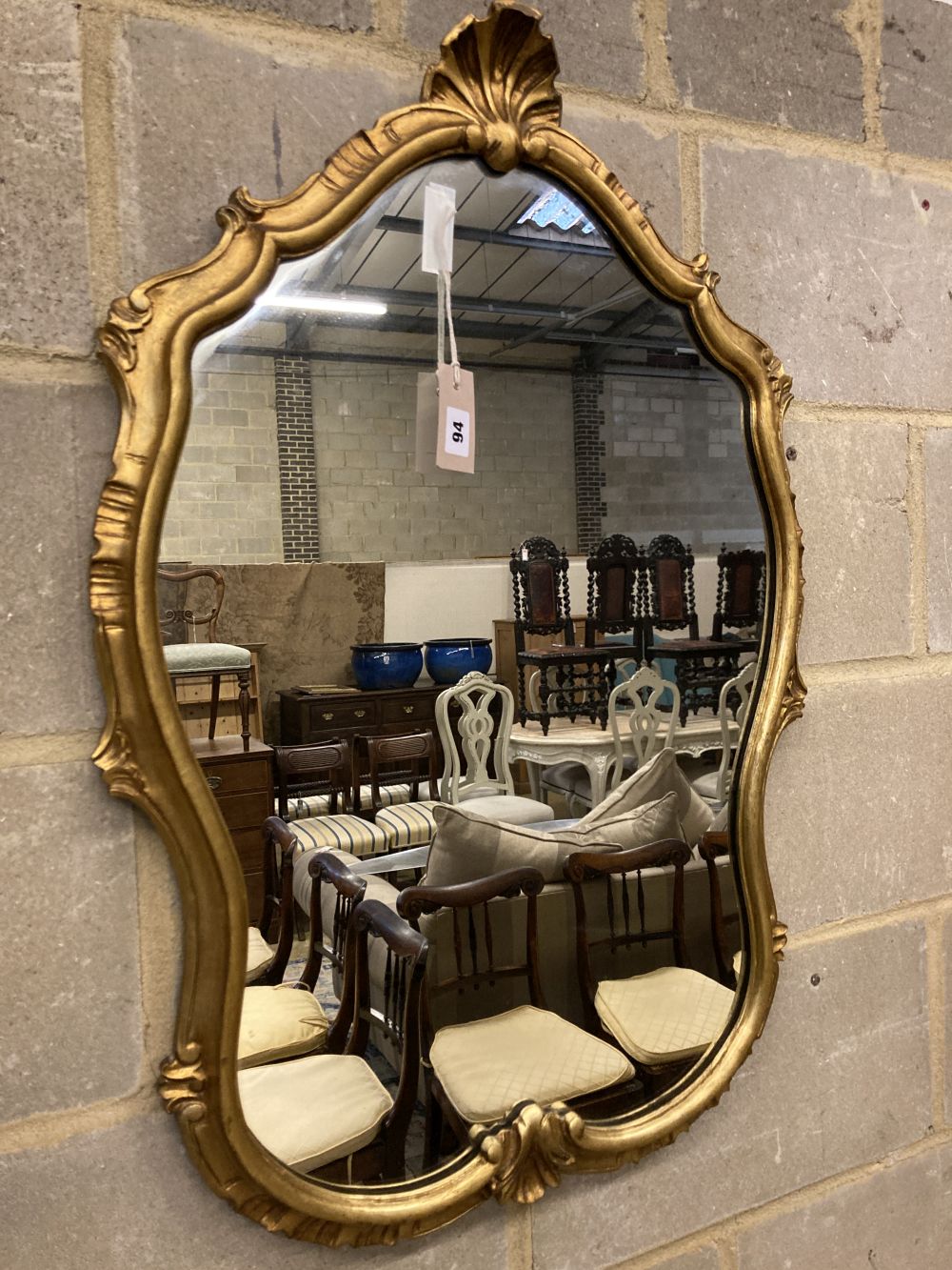 A gilt framed wall mirror, width 55cm, height 84cm